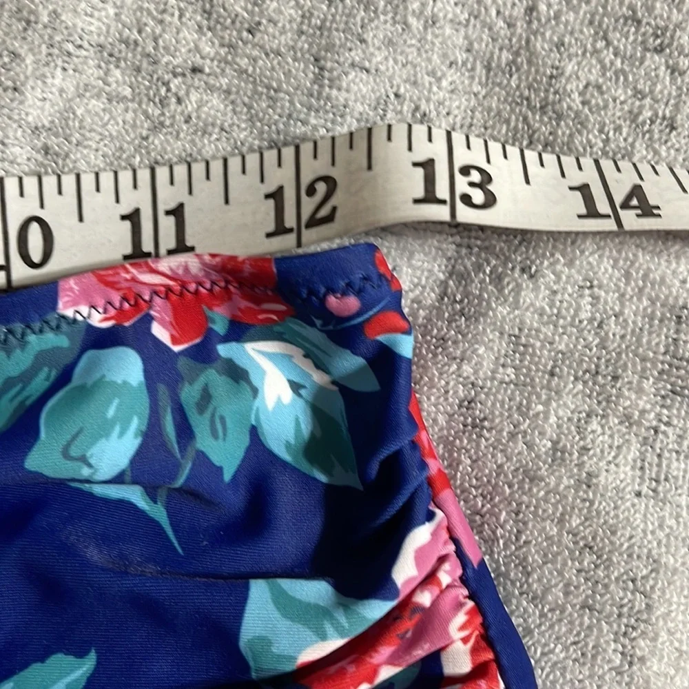 NWOT women’s blue floral swim bottoms M